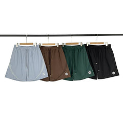 Broken Planet splicing design beach quick drying sports shorts
