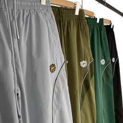Broken Planet Embroidered Loose Woven Straight Pants