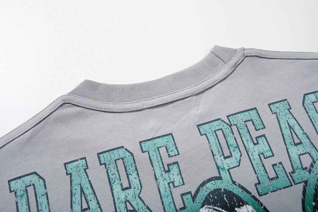 Rare Peace Retro Glow Rhinestone Oversized Graphic Tee