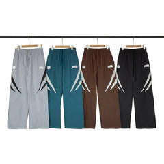 Broken Planet Woven Drawstring Straight Pants