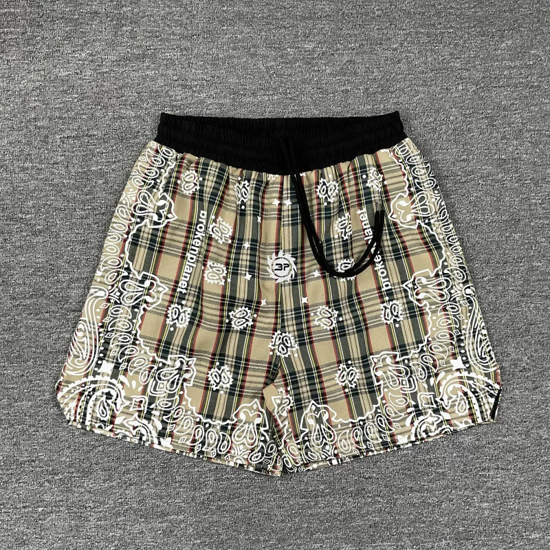 Broken Planet embroidered cashew flower full print striped checkered drawstring shorts